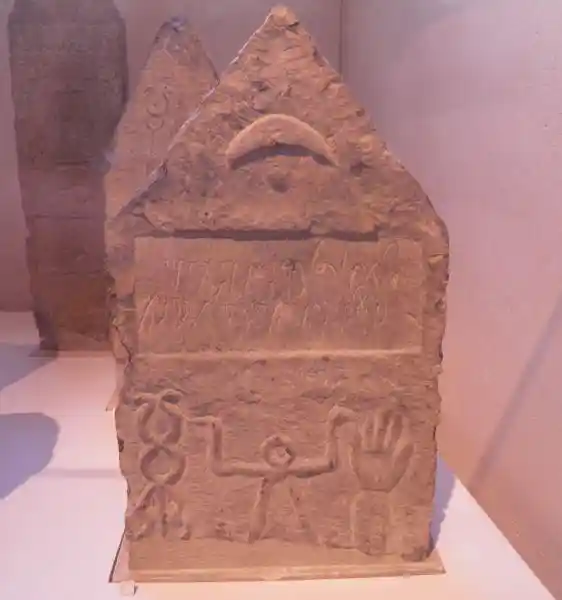 Caduceus, sign of tanit and raised hand